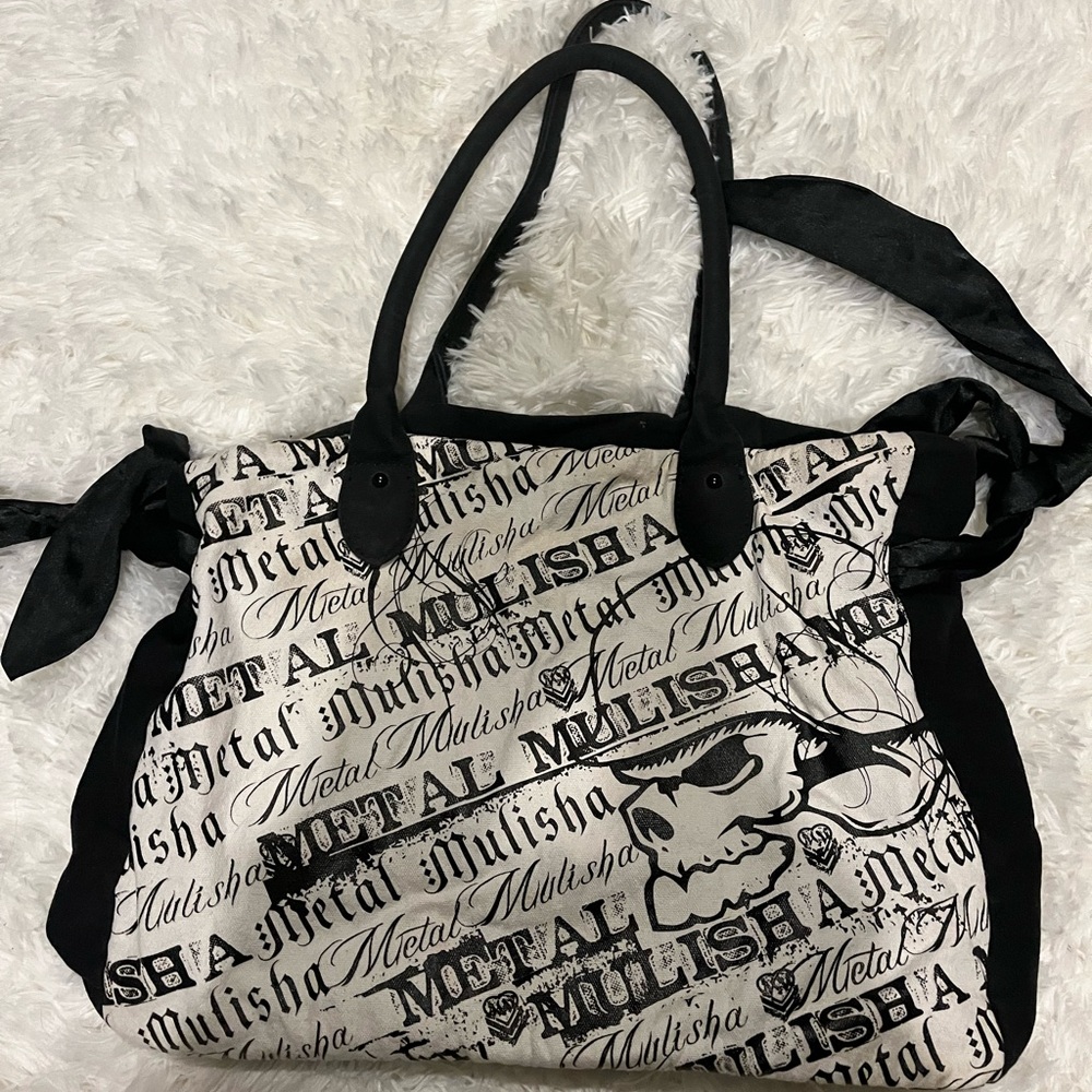 Goodcondition white and black metal mulisha purse